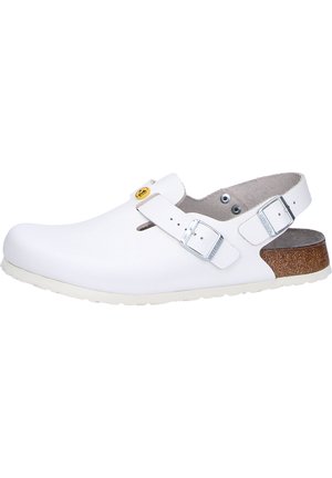 White clog-style shoe with a smooth leather upper, adjustable buckle strap, and a cork footbed. Features a rubber outsole for traction.