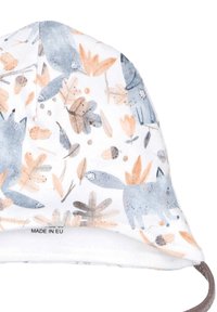 Puuvillane müts, millel on heledat halli, sinist ja virsiku leheline ning rebane trükk. Pehme tekstuur, reguleeritav lõuatrib, sildiga "Valmistatud EL-is".