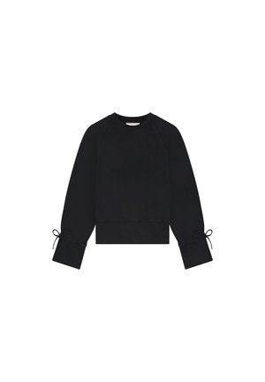 Zwarte sweatshirt met raglanmouwen, een cropped ontwerp en strikdetails bij de manchetten. Gemaakt van zachte, gestructureerde stof. Subtiele logo aan de voorkant.