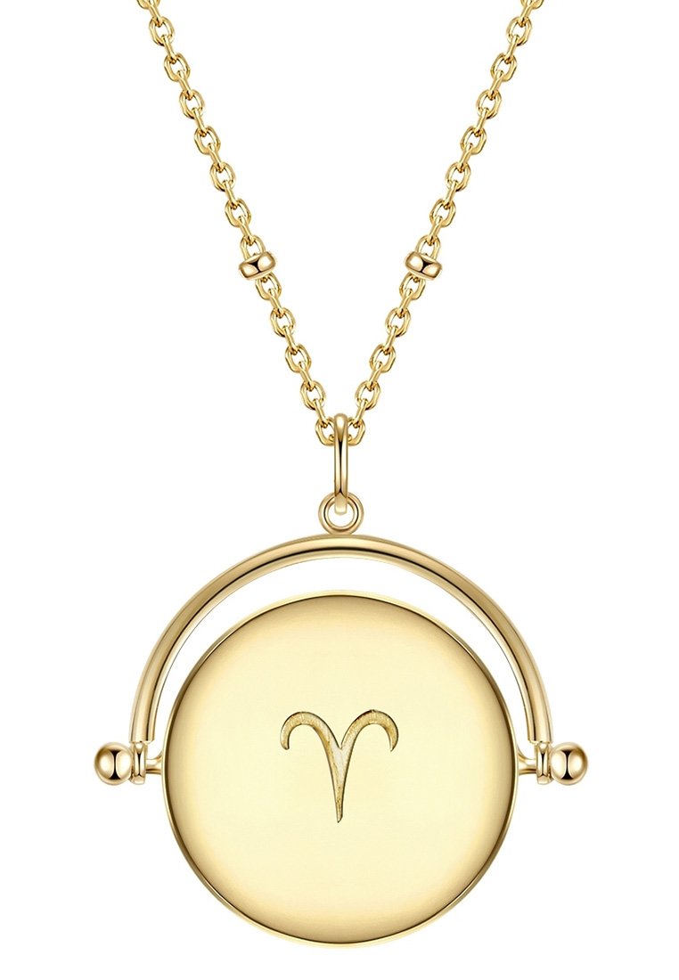 Collar de oro con un colgante circular que presenta un símbolo de Aries grabado, suspendido de una cadena con acentos circulares y eslabones.