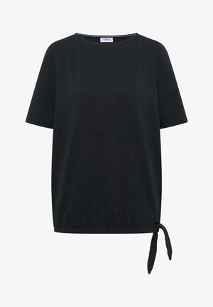 Haut noir texturé à manches courtes avec encolure ronde et détail de nœud sur le côté de l’ourlet, étiqueté « Cecil » à l’intérieur du col.