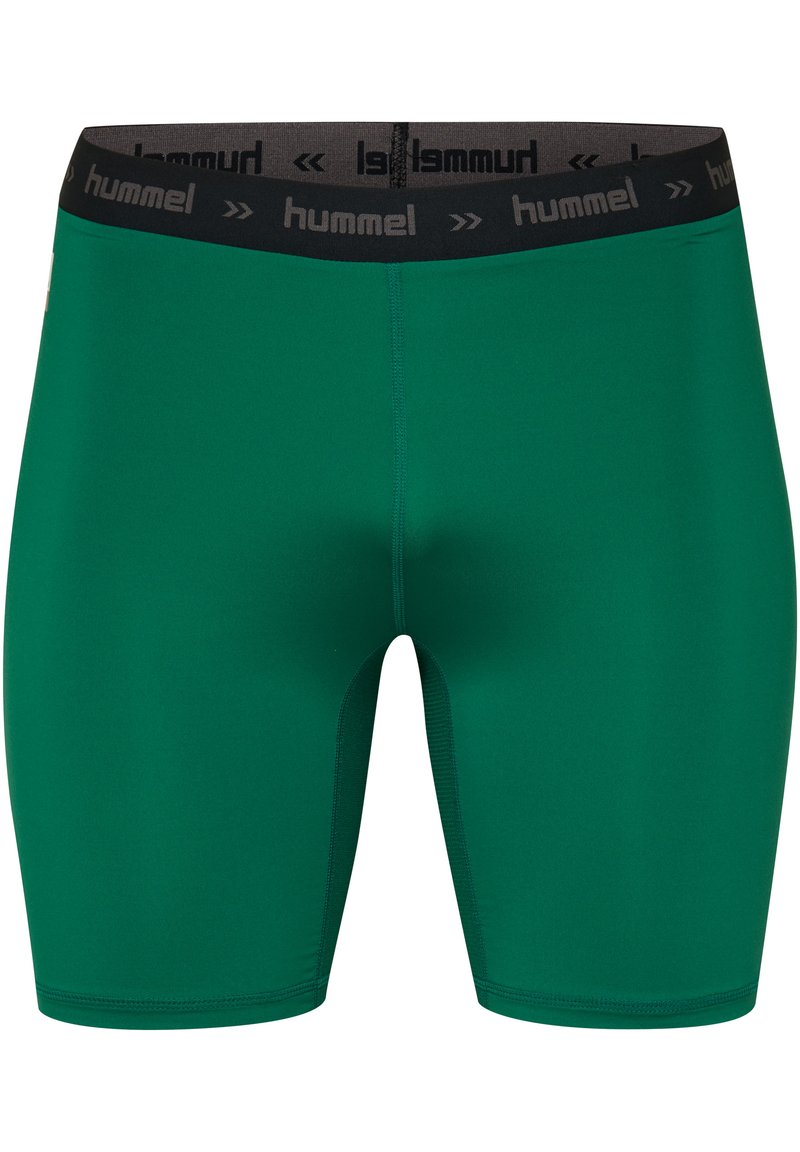 Groene sportieve shorts met een getailleerd design, gemaakt van gladde stof. Voorzien van een zwarte tailleband met het "hummel" logo. Naadloze constructie.