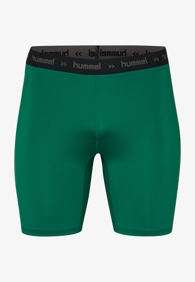 Grüne Sportshorts mit taillierter Passform, aus glattem Stoff. Mit einem schwarzen Bund und "hummel"-Logo. Nahtlose Konstruktion.