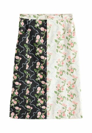 Fustă midi cu model floral, având un design cu despicătură, o parte neagră și o parte albă, ambele împodobite cu flori și frunze decorative.