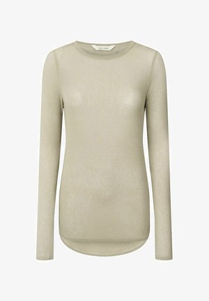 Cămașă lungă bej deschis, cu mâneci lungi, guler rotund și tiv curbat. Fabricată dintr-un material moale și neted, cu cusături minime și fără modele.