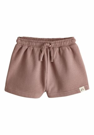 Pantaloni scurți moi pentru copii mici, de culoare liliac deschis, cu talie elastică și șnur, având o etichetă mică din material cu o pictogramă curcubeu pe tiv.