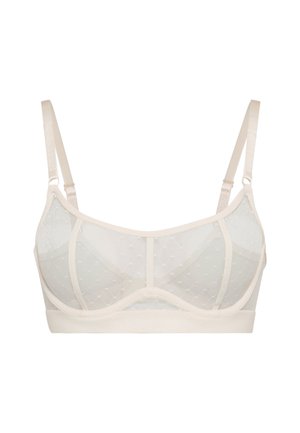 Μπεζ διάφανο σουτιέν από διαφανές δίχτυ με ρυθμιζόμενους ιμάντες, κύπελλα με μπανέλα και διακριτικό πουά μοτίβο για ελαφριά υποστήριξη και άνεση.
