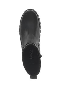 Schwarze Lederstiefelette mit runder Spitze, strukturiertem Sohlenprofil und seitlichem Reißverschluss. Merkmale sind dezente Branding-Details, die innen sichtbar sind. Glatte Oberfläche.