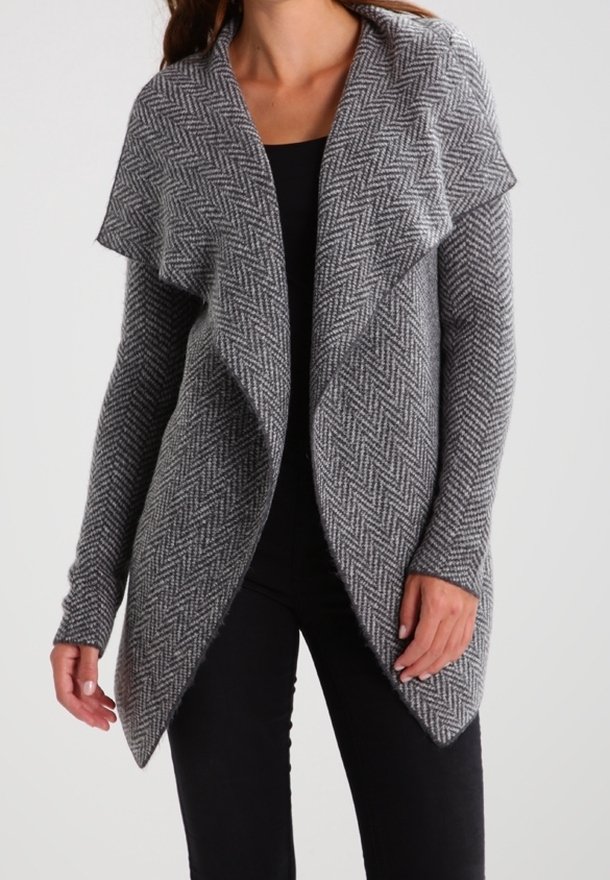 Gray herringbone cardigan with open front, long sleeves, and draped collar. Soft, textured knit fabric. Fitted silhouette with side pockets.