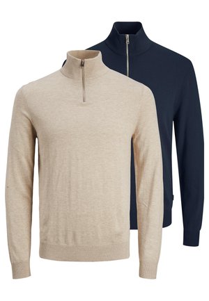 Beżowe i granatowe swetry z długim rękawem i półzamkiem, z prążkowanymi mankietami i kołnierzami, prezentowane na białym tle.