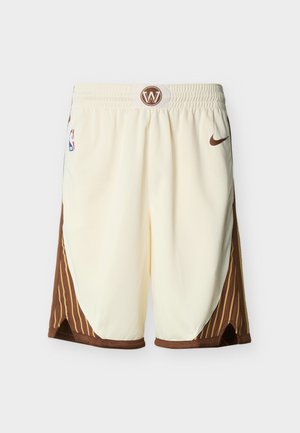 Kreminės spalvos krepšinio šortai su rudo ir geltono dryžuotais šonais, NBA ir Nike logotipais bei „W“ emblemą ant juosmens.