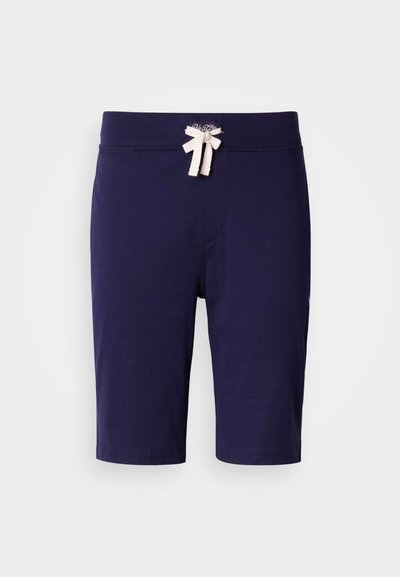 Σκούρα μπλε σορτς από μαλακό ύφασμα, με κορδόνι στη μέση και φιόγκο σε κρεμ απόχρωση. Λεία υφή, μήκος μέχρι το γόνατο.