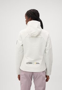 Adidas Terrex NATIONAL GEOGRAPHIC WOMEN SOFTSHELL JACKET - Casaco softshell - orbit grey