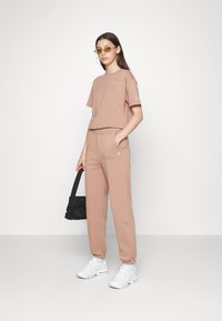 Champion Rochester ELASTIC CUFF PANTS - Spodnie treningowe