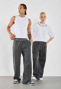 YOURTURN UNISEX - Donji dijelovi trenirke - mottled dark grey