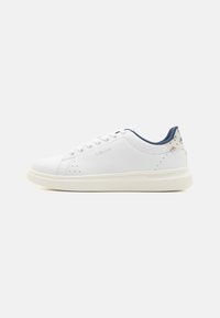 White leather sneakers with a round toe, light-colored sole, and floral accents on the heel. Features lace-up closure and perforated details.