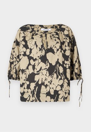 Blusa floral preta e bege com corte solto, decote redondo e mangas bufantes. Apresenta laços no decote e punhos elásticos.