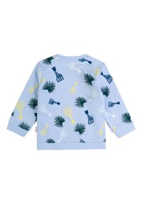 Felpa azzurra chiaro con un motivo sparso di giraffe e foglie di palma nei colori verde, giallo e blu navy, con maniche lunghe e polsini a coste.