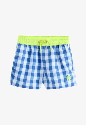 Șort de înot pentru copii, în carouri albastre și albe, cu talie elastică verde neon și șnur, având un mic patch rotund cu logo-ul unei balene.