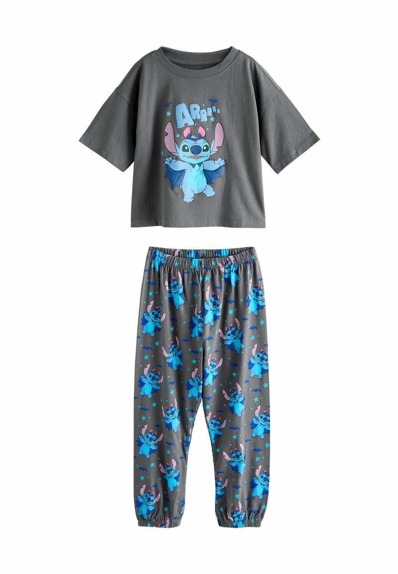 Dunkelgraues Baumwoll-Pyjama-Set mit einem kurzärmeligen Shirt, das mit einem blauen Cartoon-Charakter bedruckt ist, und einer passenden Hose, die mit mehreren Charaktermotiven verziert ist.