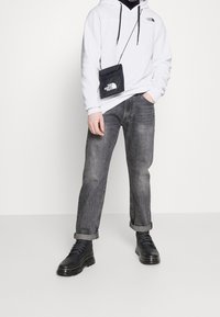 The North Face Mikina s kapucí - white