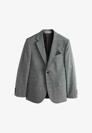 Grå ternet blazer med hakket revers, to forlommer og en brystlomme med et mørkebrunt lommetørklæde. Glat stofftekstur.