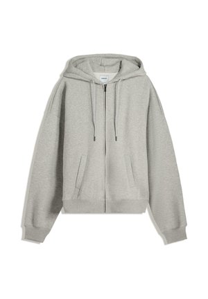 Felpa grigia con zip realizzata in un morbido mix di cotone. Caratterizzata da un grande cappuccio, cordini e tasche laterali. Vestibilità comoda con polsini a costine.