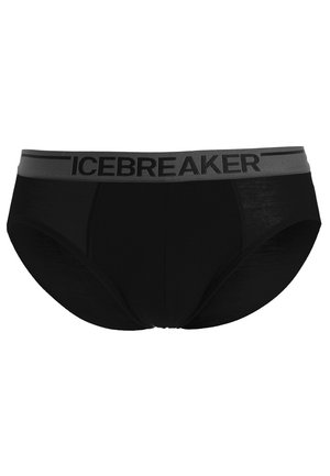 Slip negros confeccionados con un material suave y una cinturilla elástica gris donde se exhibe de manera destacada el nombre de la marca "ICEBREAKER".