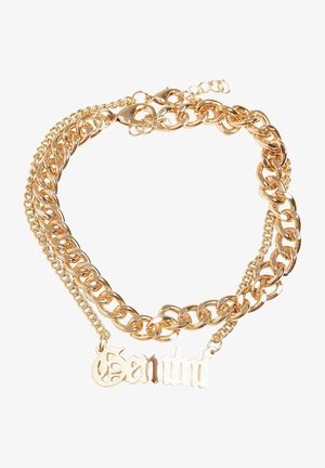 Guldfarvet halskæde med flere kædestile, herunder curb- og linkdesign, med en vedhæng der viser navnet "Santi."