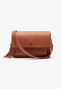 Brown leather crossbody bag with a flat design, snap closure, and a tasseled accent. Features a detachable shoulder strap.