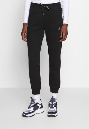 Pantalones deportivos - black