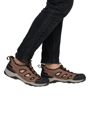 Brown and black hiking shoes with mesh cutouts, rubber toe caps, and grey soles. Features a lace-up design and rear pull tab.