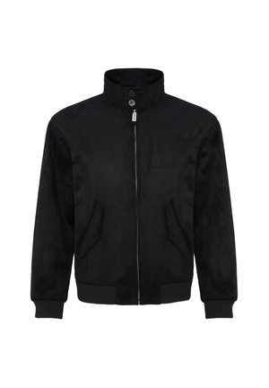 Veste noire zippée avec col haut, deux boutons au niveau du cou, deux poches inclinées et poignets et ceinture côtelés.