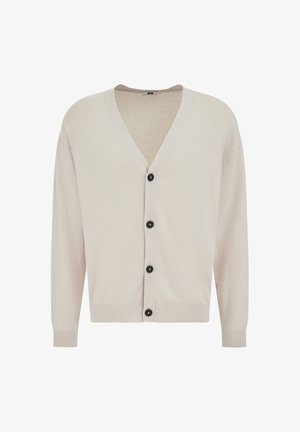 Svetlobéžový kardigán s výstrihom do V, dlhými rukávmi a štyrmi čiernymi gombíkmi vpredu.