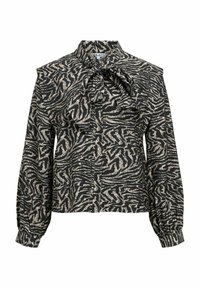 Musta pusero, jossa kultainen seepra-kuvio, korkea pääntie, kauluksessa röyhelöyksityiskohta ja pitkät ilmapallo-hiha. Kankaan pinta on teksturoitu.