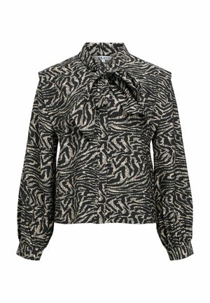 Musta pusero, jossa kultainen seepra-kuvio, korkea pääntie, kauluksessa röyhelöyksityiskohta ja pitkät ilmapallo-hiha. Kankaan pinta on teksturoitu.