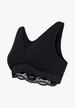 Zwarte bralette van zacht materiaal, met een V-halsontwerp en kantafwerking langs de onderkant, met golvende randen en een gladde textuur.