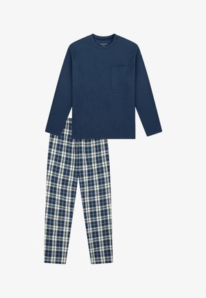 Camisa de manga larga azul marino con bolsillo en el pecho combinada con pantalones de pijama a cuadros azules y blancos.