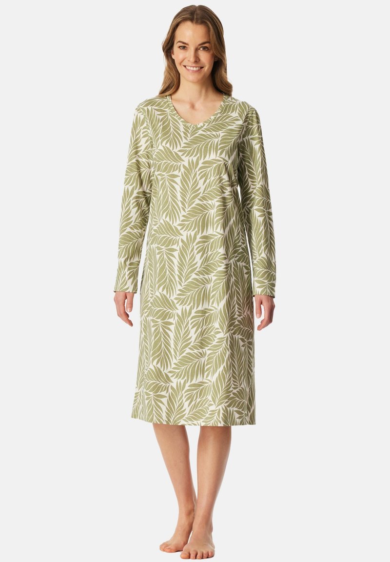Nattkjole med langærmer i blød bomuld, med et grønt bladmotiv på en lys baggrund, med v-udskæring og knælængde.