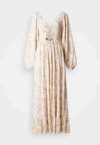 Robe longue à manches bouffantes en beige avec un motif floral blanc, présentant une taille froncée, un avant à lacets et un ourlet volanté.