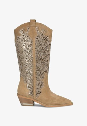 - Kowbojki i obuwie motocyklowe