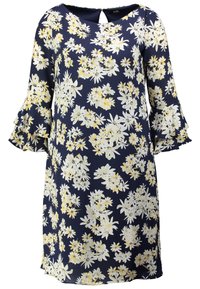 Marinblå blommig klänning med mönster av gula och vita blommor. Har volangärmar och en detalj med nyckelhål i ryggen, tillverkad av lättviktsmaterial.