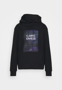 Sweat à capuche noir avec un graphique pixellisé "GAME OVER" sur le devant, présentant une impression texturée et des cordons réglables.