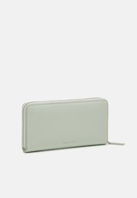 Calvin Klein DAILY LARGE ZIP AROUND WALLET - Portafoglio - milky green