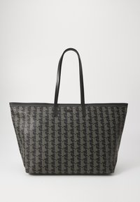 Romslig svart totebag med et geometrisk mønster i beige. Har robuste sorte lærhender og en flat form. Teksturert syntetisk materiale.