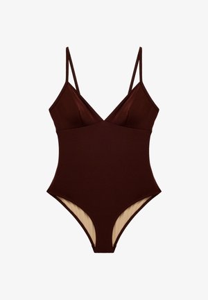 Bañador de una pieza color marrón oscuro con tirantes finos y escote en V, con un forro interior beige claro en las aperturas de las piernas.
