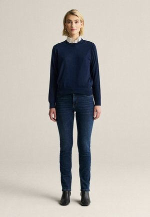 Stickad tröja - marinblå