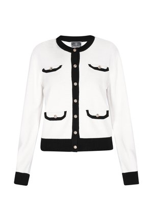 Biały kardigan z czarnymi obszyciami na kołnierzu, mankietach, dole, listwie guzikowej oraz na czterech kieszeniach z patkami, zapiętych na złote guziki.