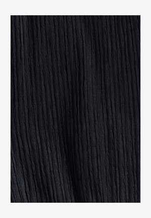 Black textured fabric with vertical pleats, featuring a slightly shiny surface. The material appears lightweight and flowy.