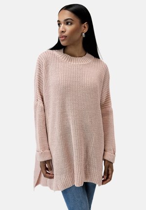 Stickad tröja - rosa